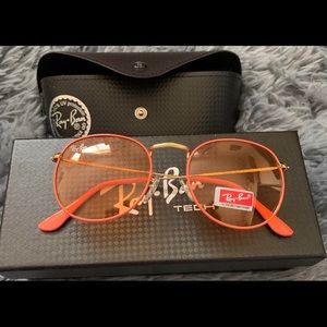 Orange rayban sunglasses